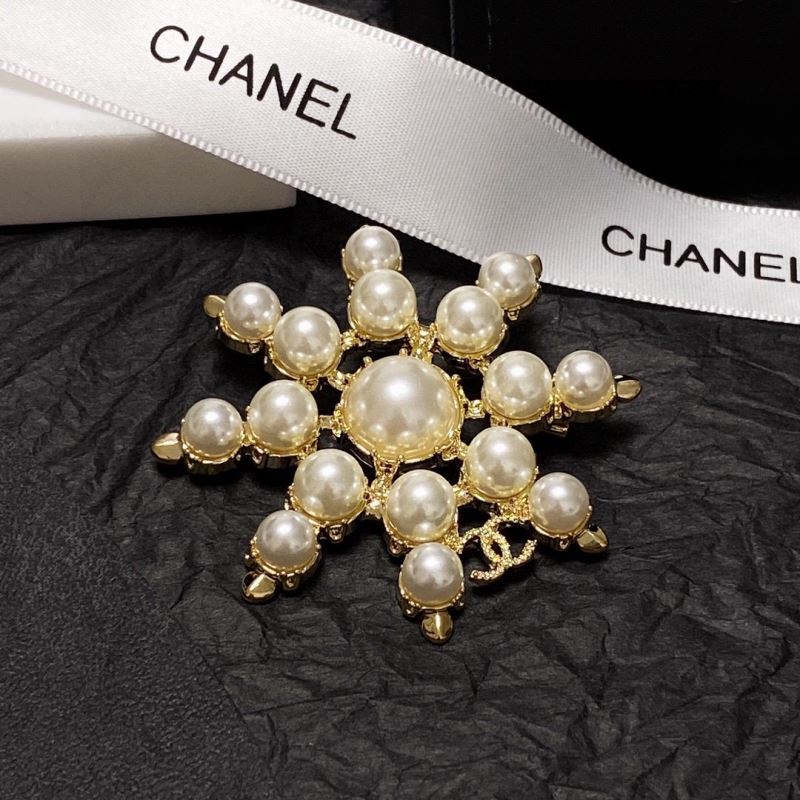 Ch*el brooches